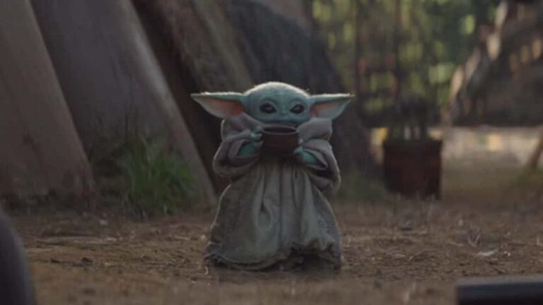 baby yoda en un paisaje galactico