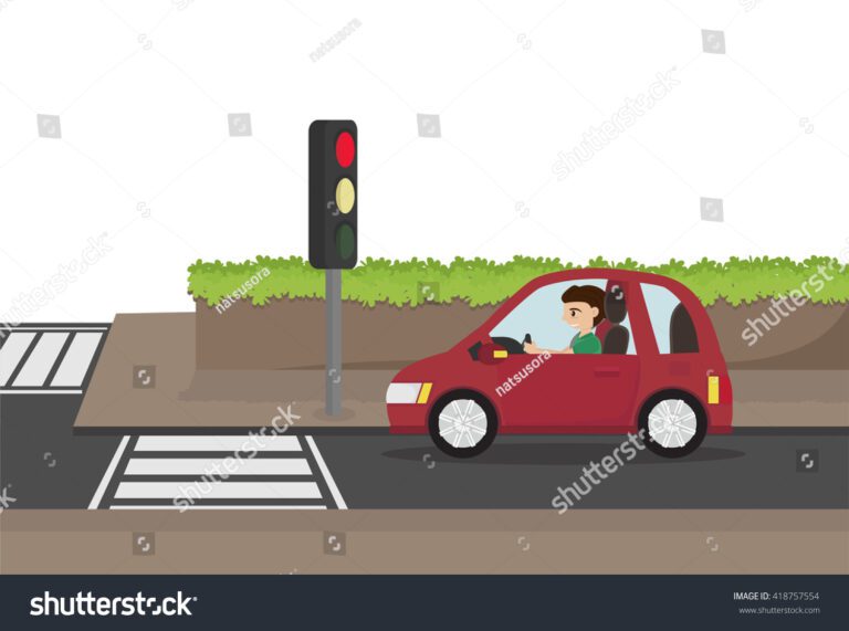 coche detenido en un semaforo en rojo