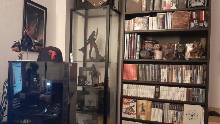 estante de videojuegos con xbox y gta v