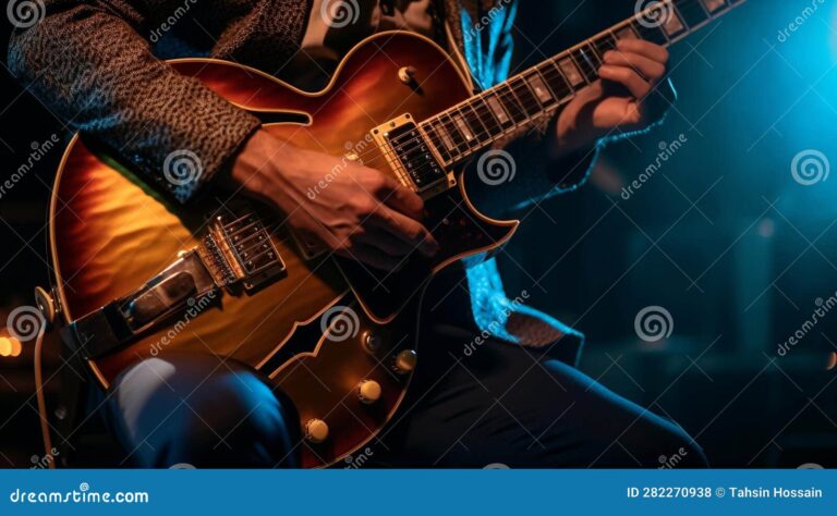 Qué series de televisión cuentan con música de Bon Jovi en su banda sonora 14 guitarrista tocando en escenario iluminado 1