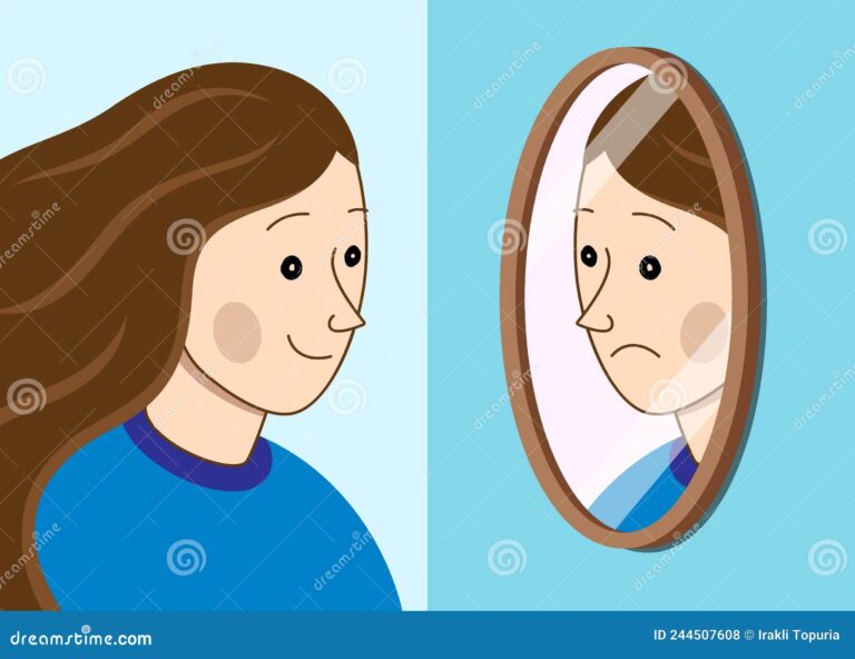 reflejo en el espejo con expresion triste